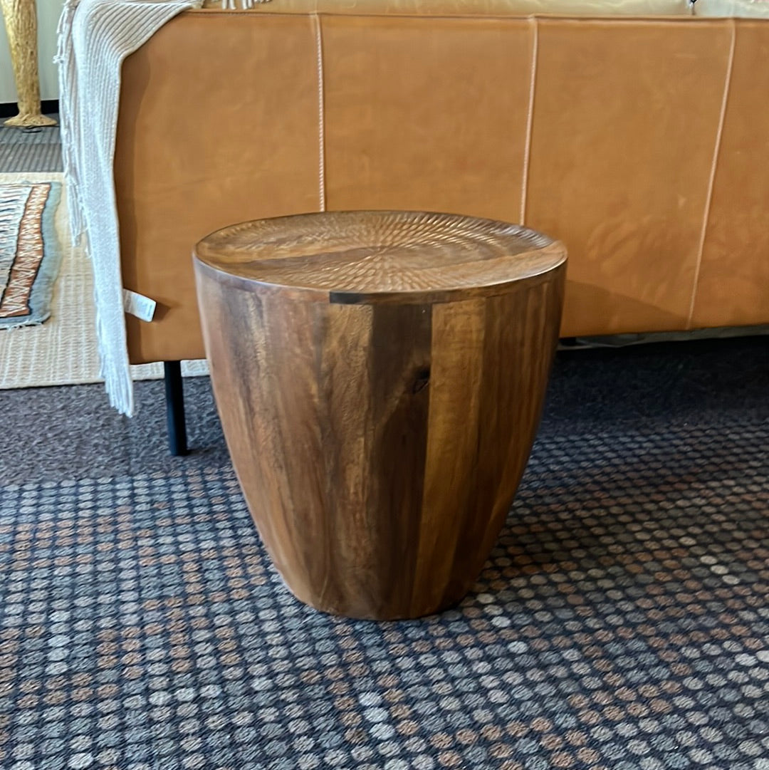 round wooden end table with carved top