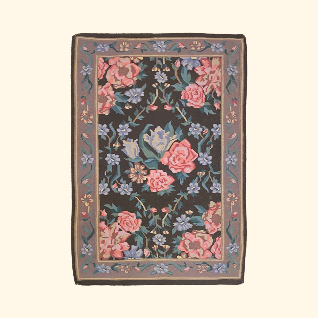 pink, brown, and blue floral pattern indian style wool rug