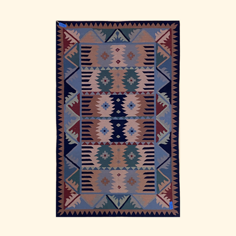 southwestern geometric muted colors wool rug