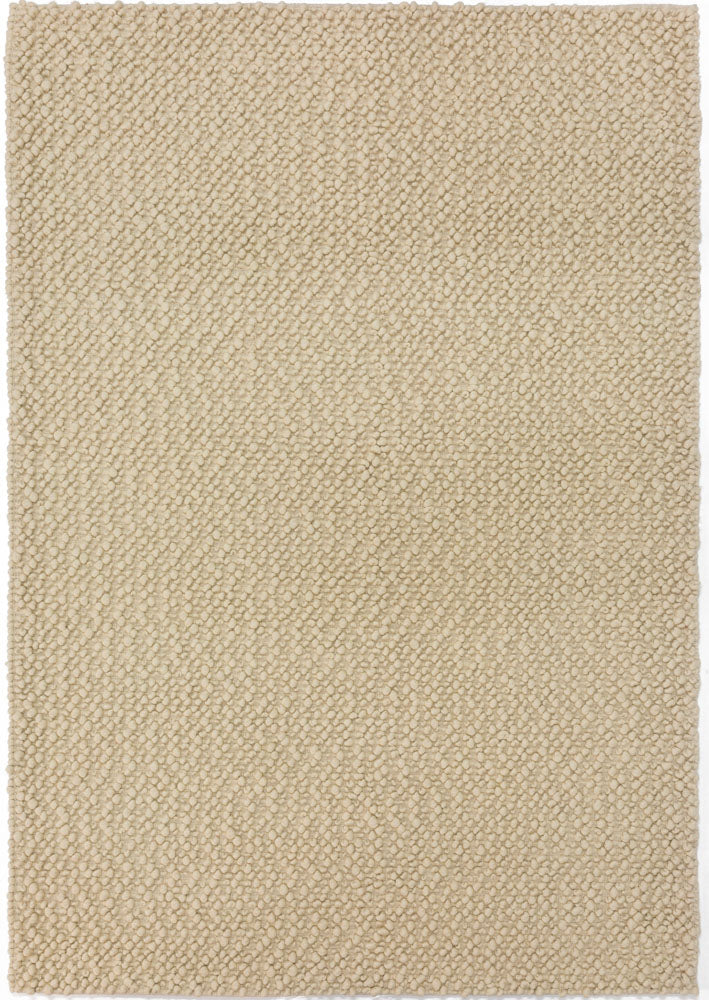 thick loop pile wool rug in the color vanilla or white