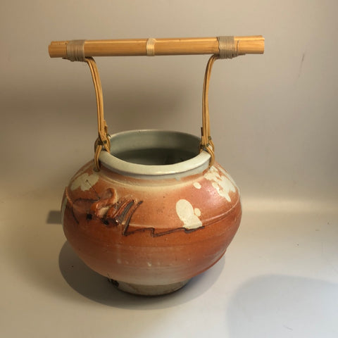 Wooden handled pottery